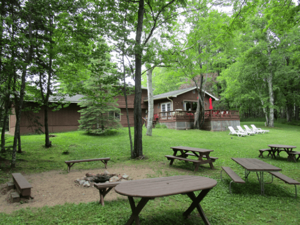 Schneider–Wick Lake House on the Sugar Camp Chain: 3 Acres, 250’ of Shoreline, and Kayaks Included. A RentWisconsinCabins.com Listing Partner Since&nbsp;2017!