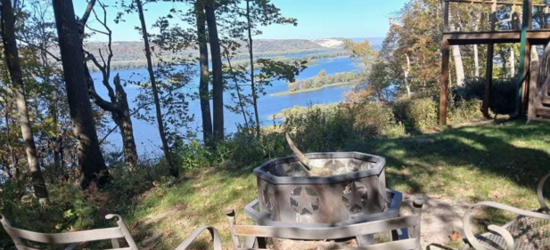 Log Cabin Retreat in Glen Haven, Wisconsin: themed cabin, river views, and your own 80 acres to roam. Now taking Direct Bookings through RentWisconsinCabins.com!