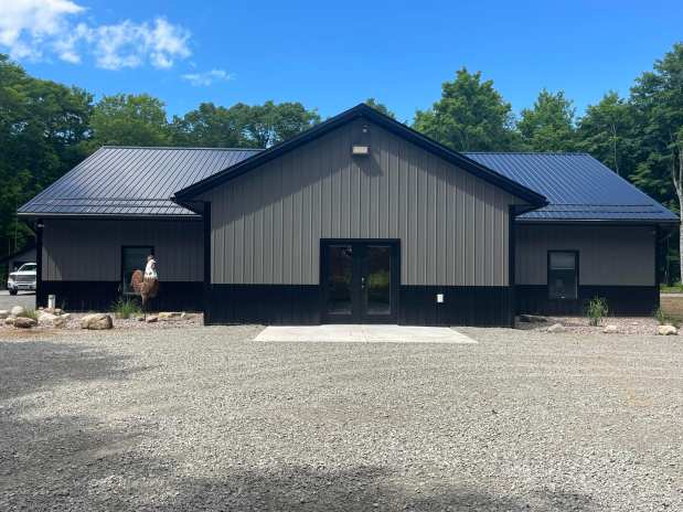 H58 Snow Cocks Lodge: Big-Group UP Lodging Built for Snowmobiles, Side-by-Sides, and Pictured Rocks Days. Now Taking Direct Bookings at RentMichiganCabins.com.